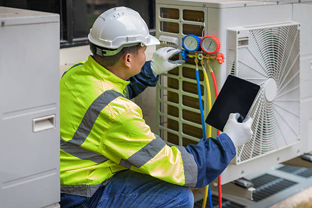 Professional Air Conditioning Repair technician working in Decatur, MI